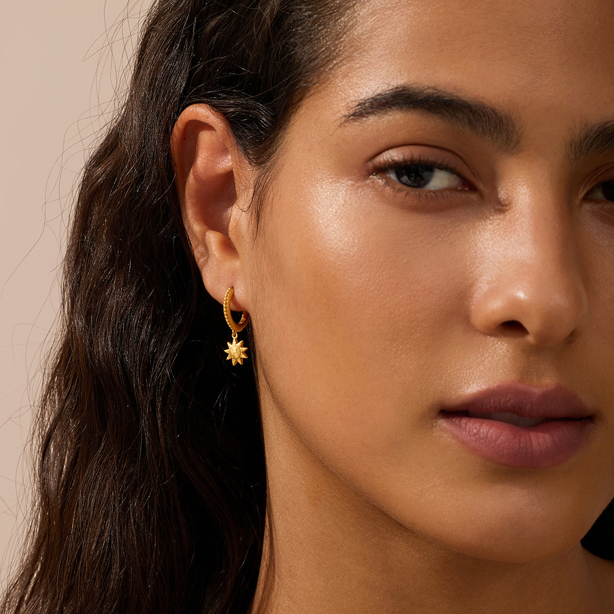 Enduring Light Gold Sun Huggie Earrings